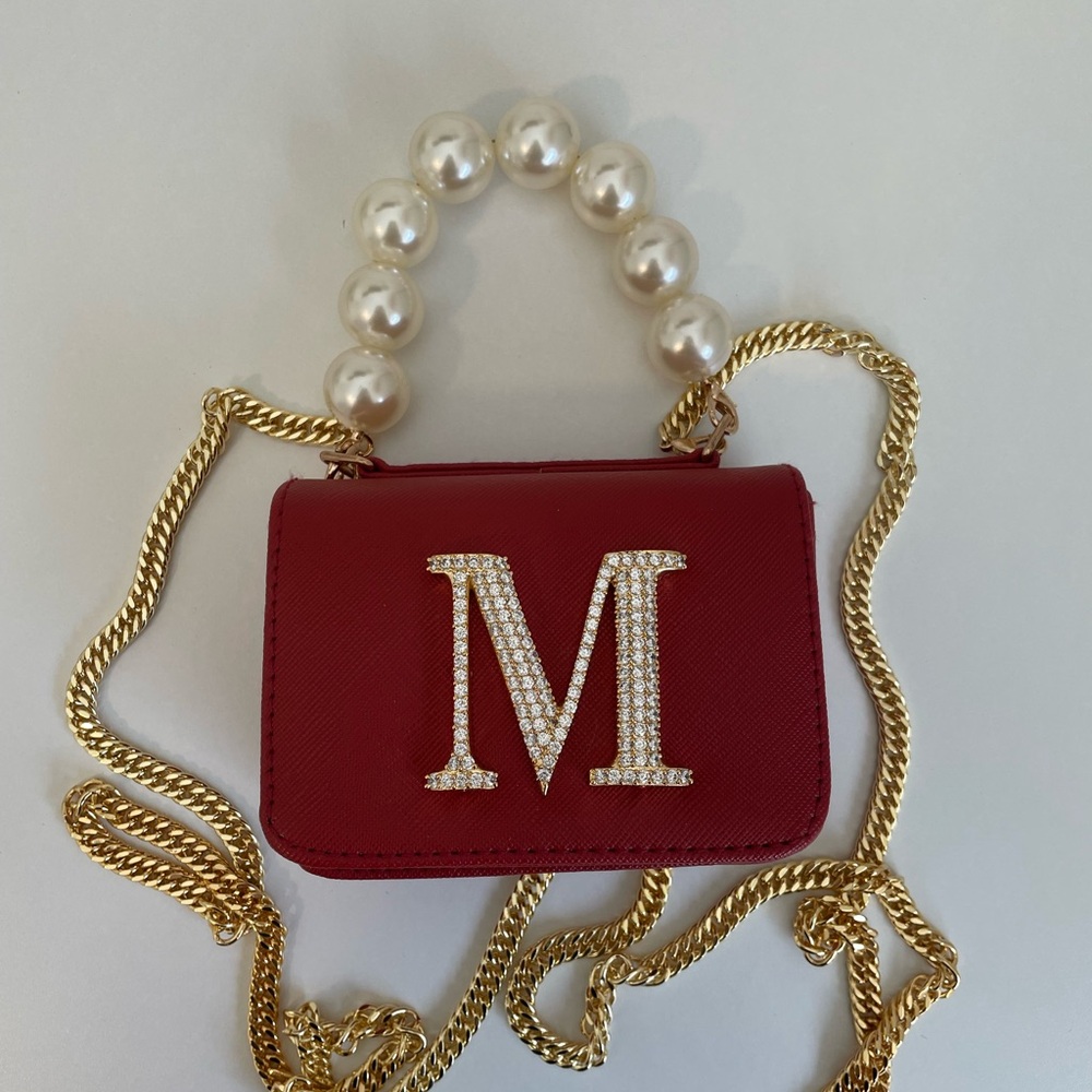 Elegant Red Handbag with Pearl Handle